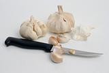 Two garlic and kitchen knife