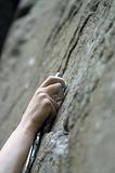 Climbers hand and quick-draws