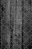 chain link fence see old wooden background