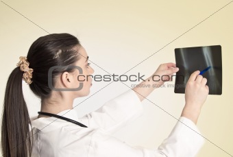  doctor watching a patient x-ray