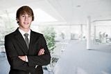 Young Businessman in front of a modern office