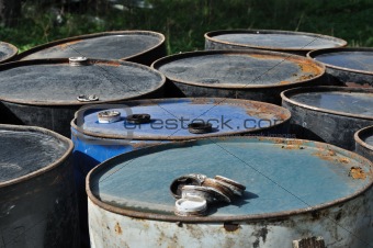 rusty metal barrels