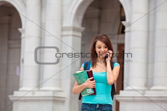 Woman at school talking on cell phone