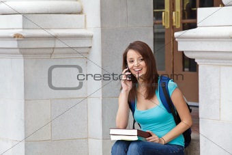 Young woman laughing on cell phone