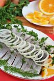 Appetizing herring with onions and oranges