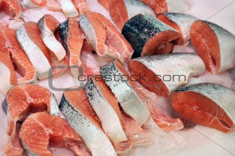 Fresh salmon steaks in the shop