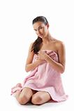 beauty model with pink towel