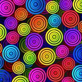Colourful rings on a black background, vector design.