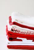 Pile of linen kitchen towels with space for your text