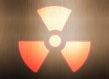 radioactive symbol on metal background