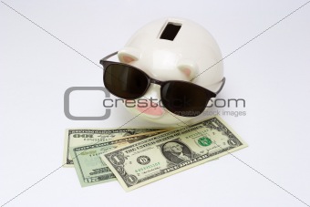 Blind piggy bank and US dollars