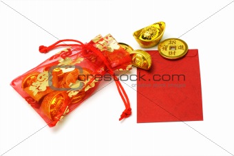 Gold ingots and coins in red sachet and red packet