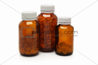 Three bottles of health supplements