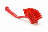 Red household plastic brush
