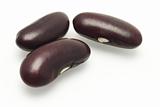 Three dark red kidney beans