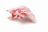Crumpled pink colored paper