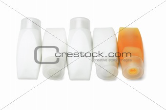 Plastic tubes of shower gel and shampoo