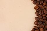 Coffee beans on old paper background