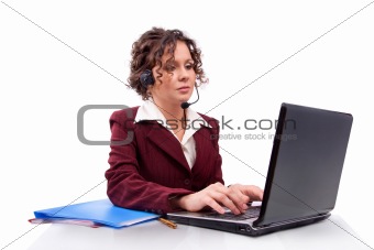 Woman with headset and laptop
