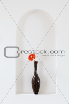 Vase with red flower
