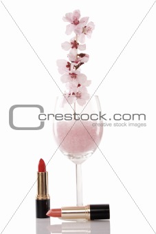 red lipsticks and cherry flower