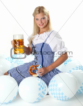 Woman with beer mug and pretzel
