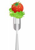 Fresh red tomato and salad on a fork