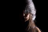 half of women face in fur-cap