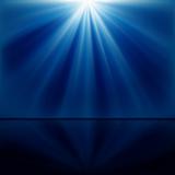 background of blue luminous rays