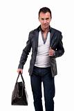 Portrait of a mature man with a handbag, isolated on white. Studio shot