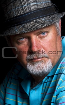 Senior caucasian man with hat - close up