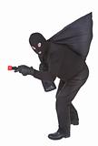 robber with flashlight and sack