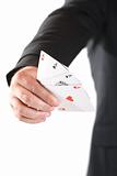 man's hand hold the four aces