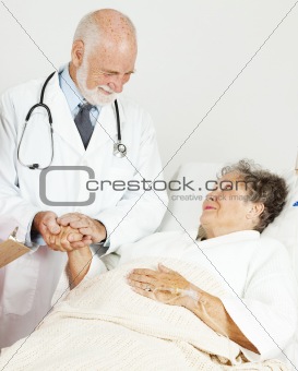 Doctor Comforting Senior Patient