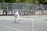 Senior Woman Plays Tennis