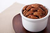 High key picture of pecans in a bowl