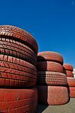 close up of racetrack fence of  red old tires