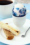 breakfast, boiled egg and coffee  on blue napkin