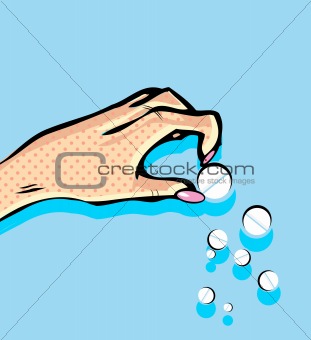 Female hand holding pharmaceuticals pill