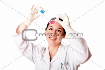 Female scientist looking at tissue culture flask