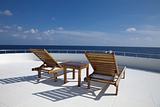 Deck chair on the cruising boat