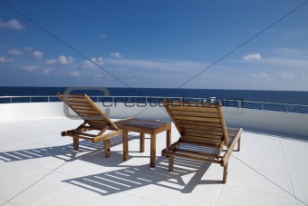 Deck chair on the cruising boat