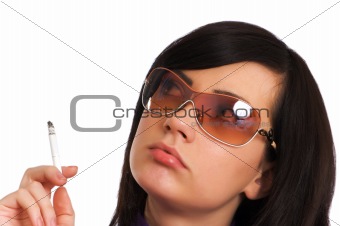Young girl smoking isolated on the white