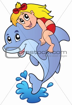 Girl sitting on dolphin