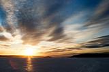 Sunset on Frozen Lake