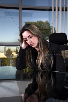 depressed at her desk