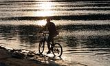 Bike silhouette in the river