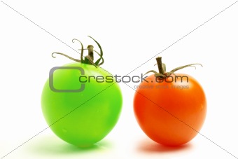 two tomatoes on white