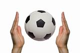 Soccer ball between two hands