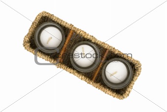 Wicker box with candles isolated